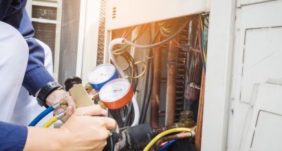 Technician is checking air conditioner